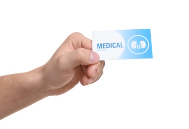 Photo of Man holding medical business card isolated on white, closeup. Nephrology service