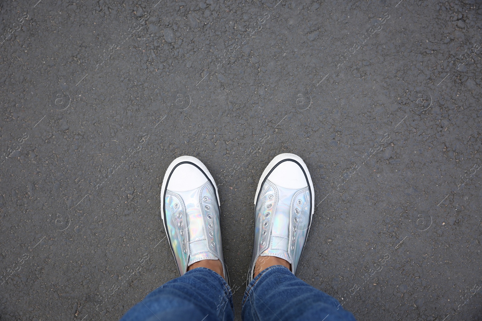 Photo of Woman standing outdoors, top view. Space for text