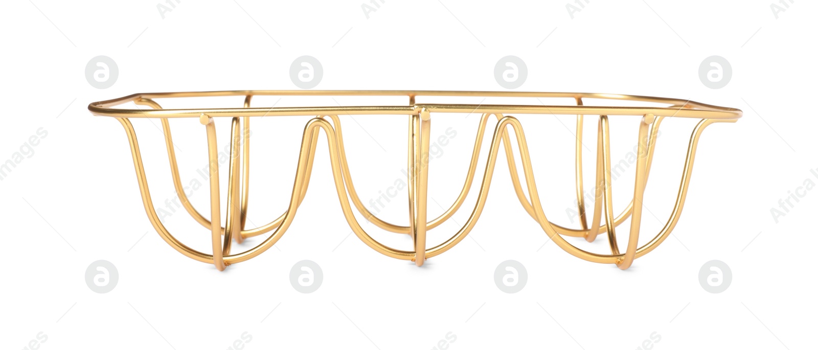 Photo of Golden metal egg tray on white background