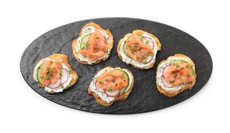 Photo of Tasty canapes with salmon, cucumber, radish and cream cheese isolated on white, top view