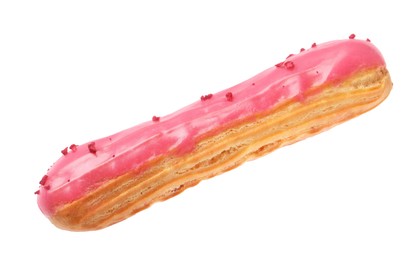 Photo of Delicious eclair covered with pink glaze isolated on white