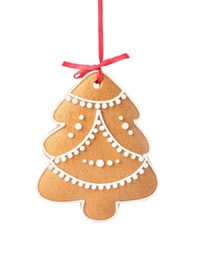 Photo of Christmas tree shaped cookie with string isolated on white