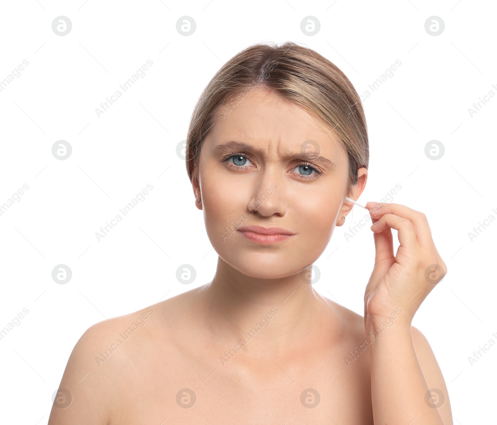 Photo of Young woman cleaning ear with cotton swab on white background