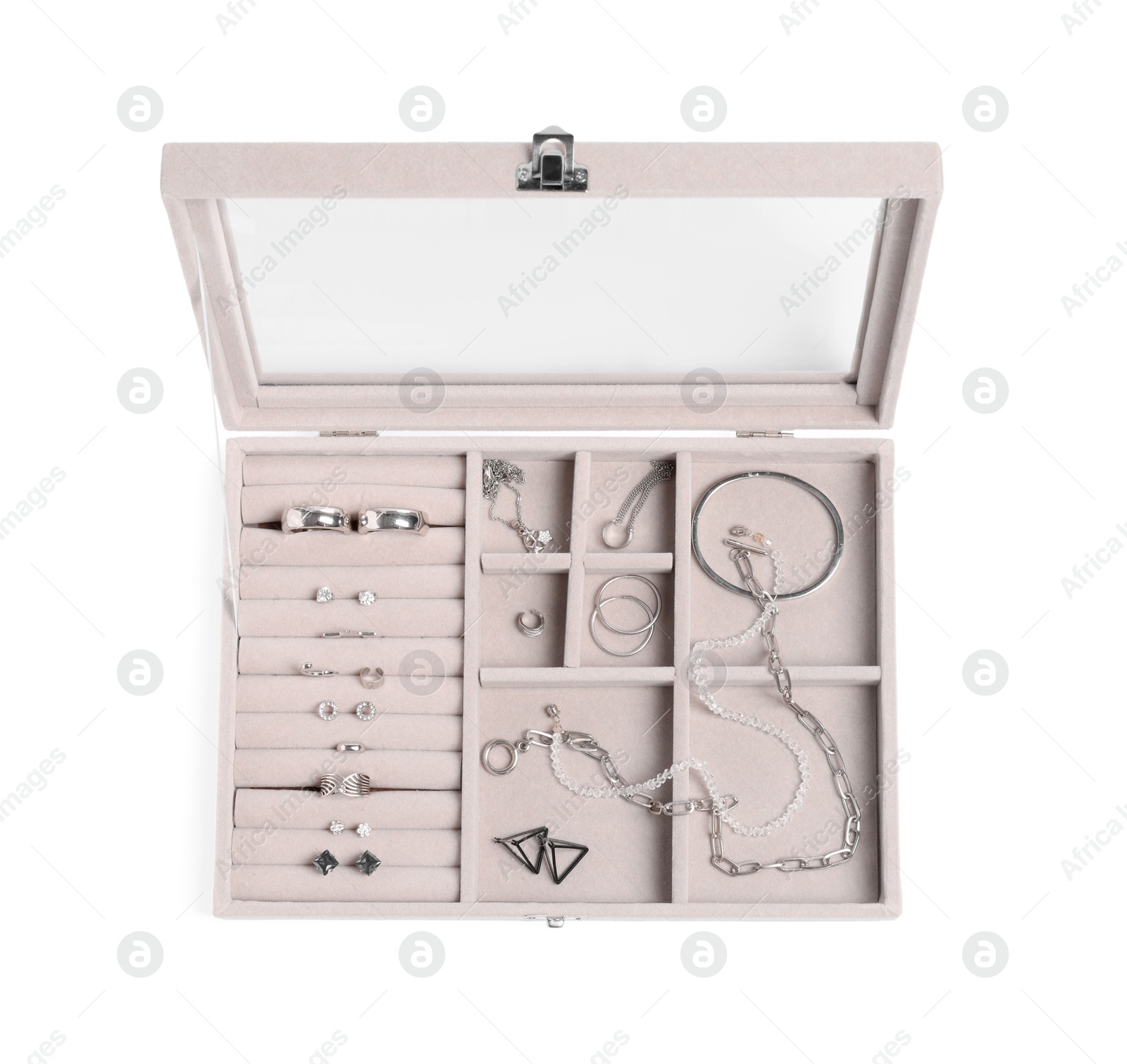 Photo of Jewelry box with many different silver accessories isolated on white, top view