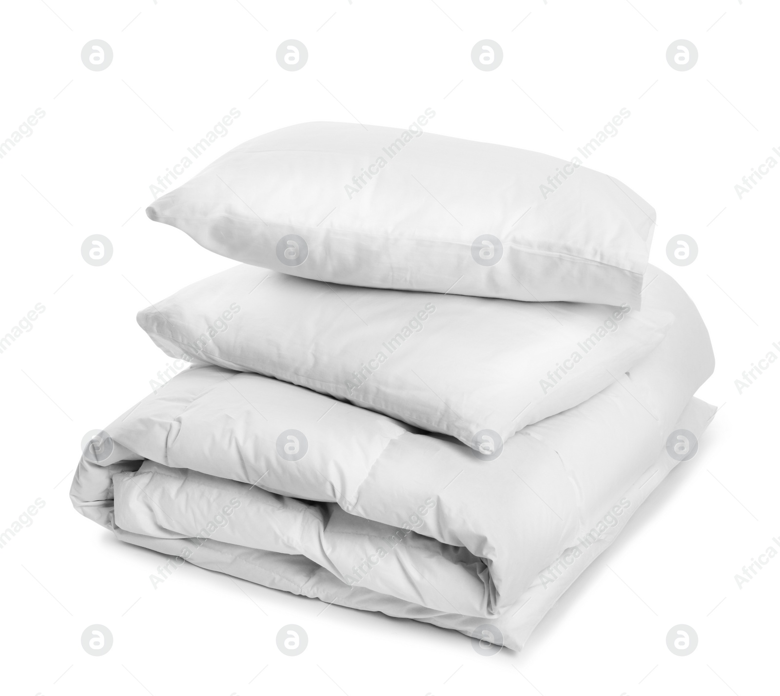 Photo of Clean blanket and pillows on white background