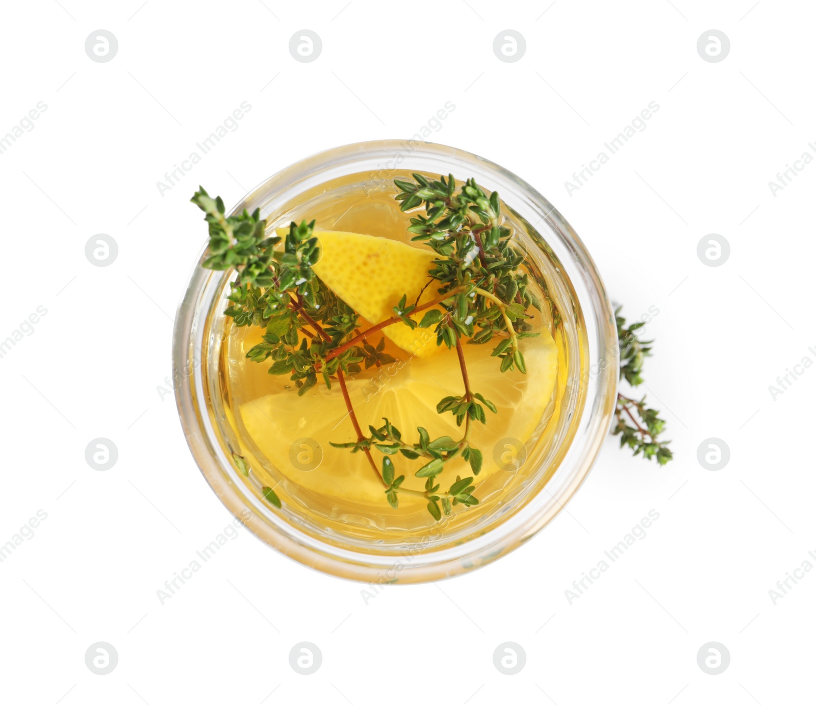 Photo of Aromatic herbal tea with thyme and lemon isolated on white