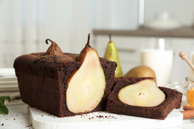 Photo of Tasty pear bread on table. Homemade cake