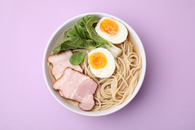 Photo of Delicious ramen with meat on violet background, top view. Noodle soup