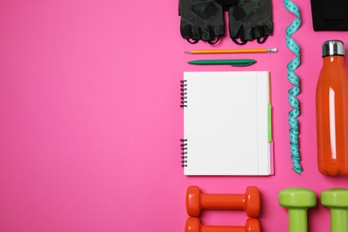 Photo of Notebook, pen and sports equipment on pink background, flat lay with space for text. Personal training