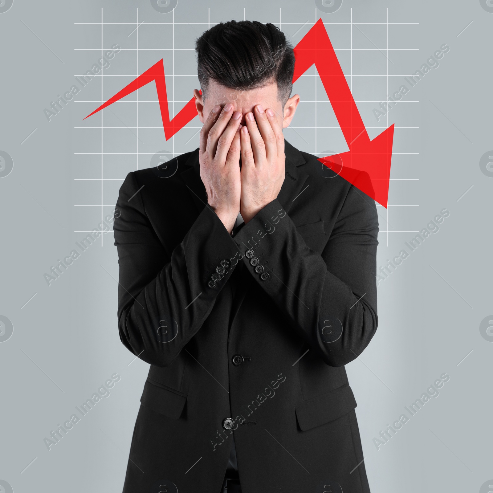 Image of Upset businessman and illustration of falling down chart on light grey background. Economy recession concept