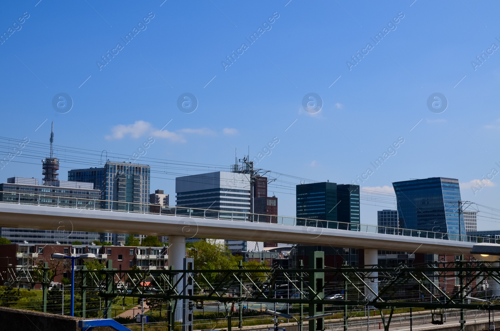 Photo of Beautiful modern buildings in city street. Urban architecture