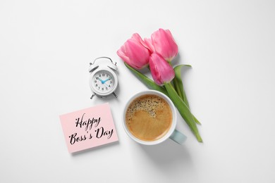 Image of Card with phrase Happy Boss`s Day, coffee, alarm clock and tulips on white table, flat lay