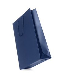 Photo of One dark blue shopping bag isolated on white