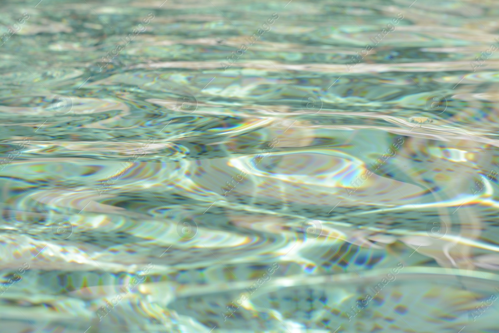 Photo of Rippled water in swimming pool as background