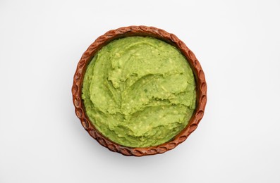 Photo of Delicious guacamole made of avocados on white background, top view