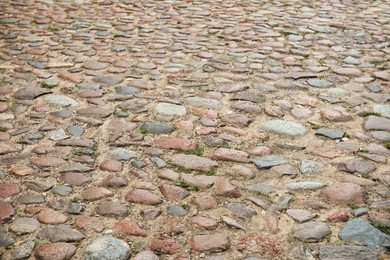 Photo of Closeup view of view natural stone paving as background