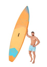 Happy man with orange SUP board on white background