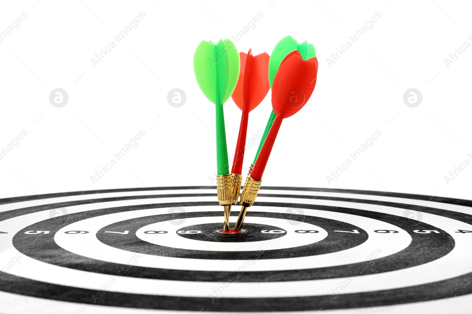 Photo of Arrows hitting target on dart board against white background