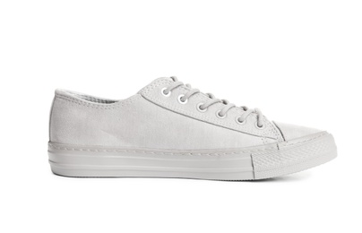 Photo of Stylish sneaker on white background. Trendy footwear