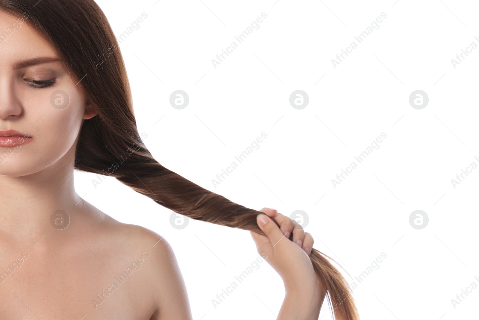 Photo of Young woman with strong healthy hair on white background