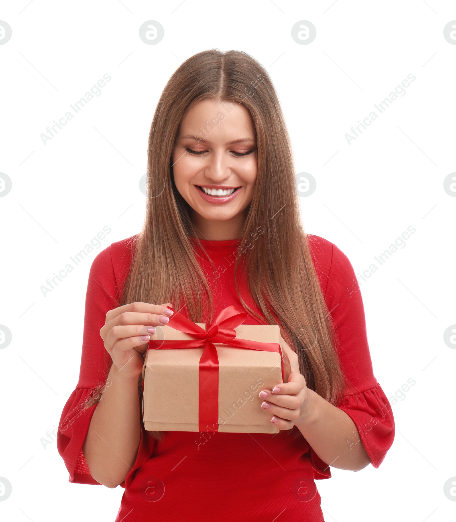 Photo of Happy young woman with Christmas gift on white background