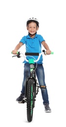 Portrait of cute little boy with bicycle on white background