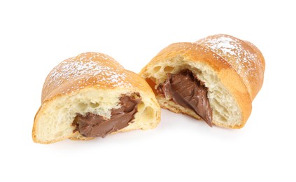 Photo of Halves of tasty croissant with chocolate and sugar powder on white background