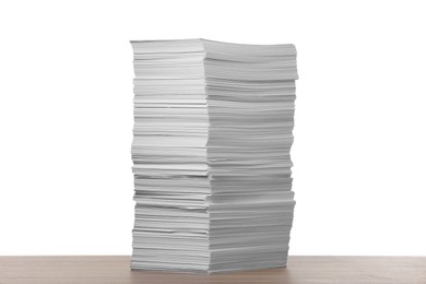 Photo of Stack of paper sheets on wooden table against white background