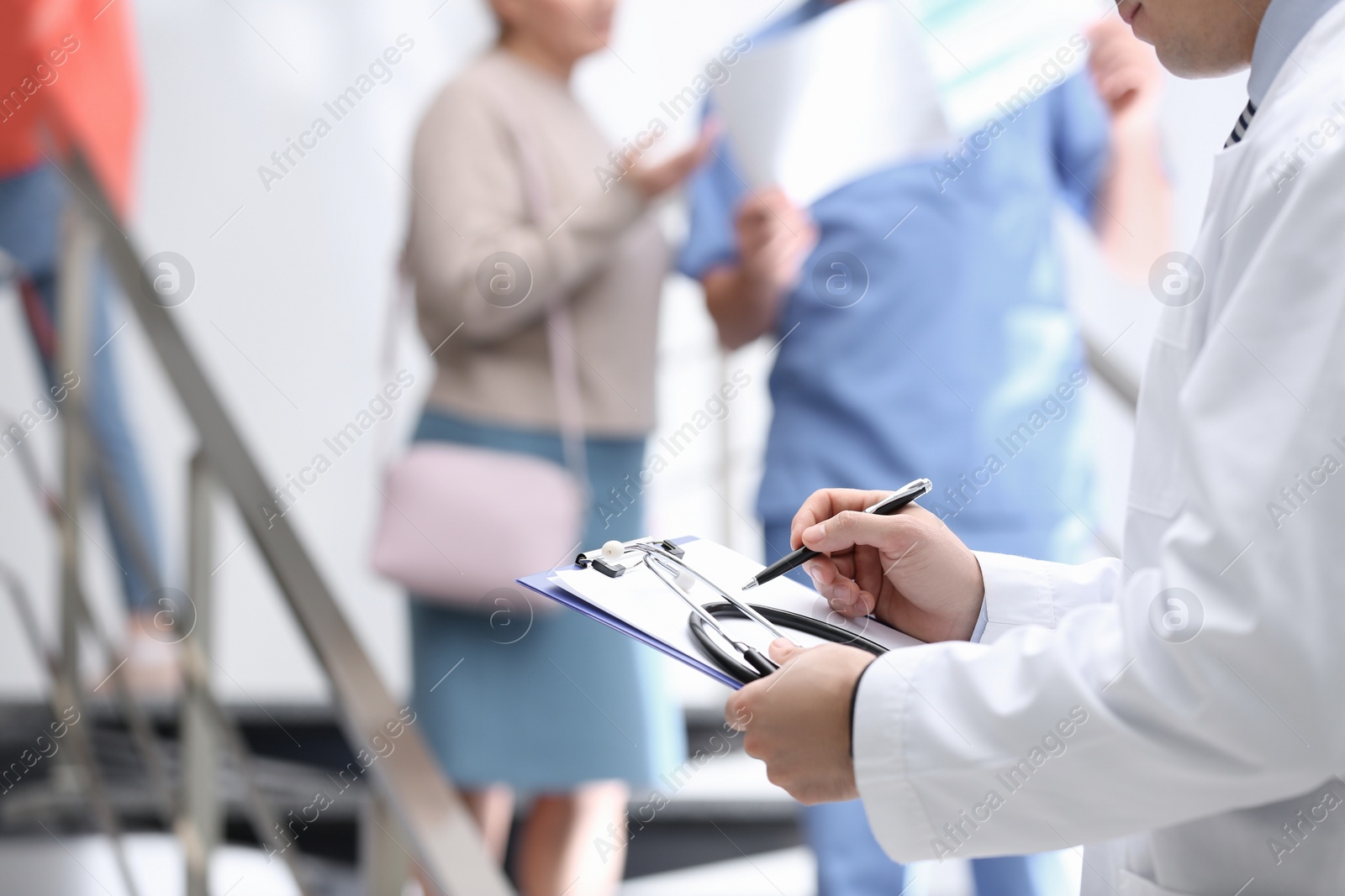 Photo of Doctor checking patient's analysis results in hospital, closeup