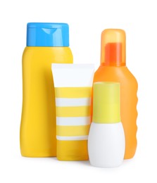 Many different suntan products on white background