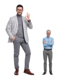 Image of Happy giant boss and small man on white background