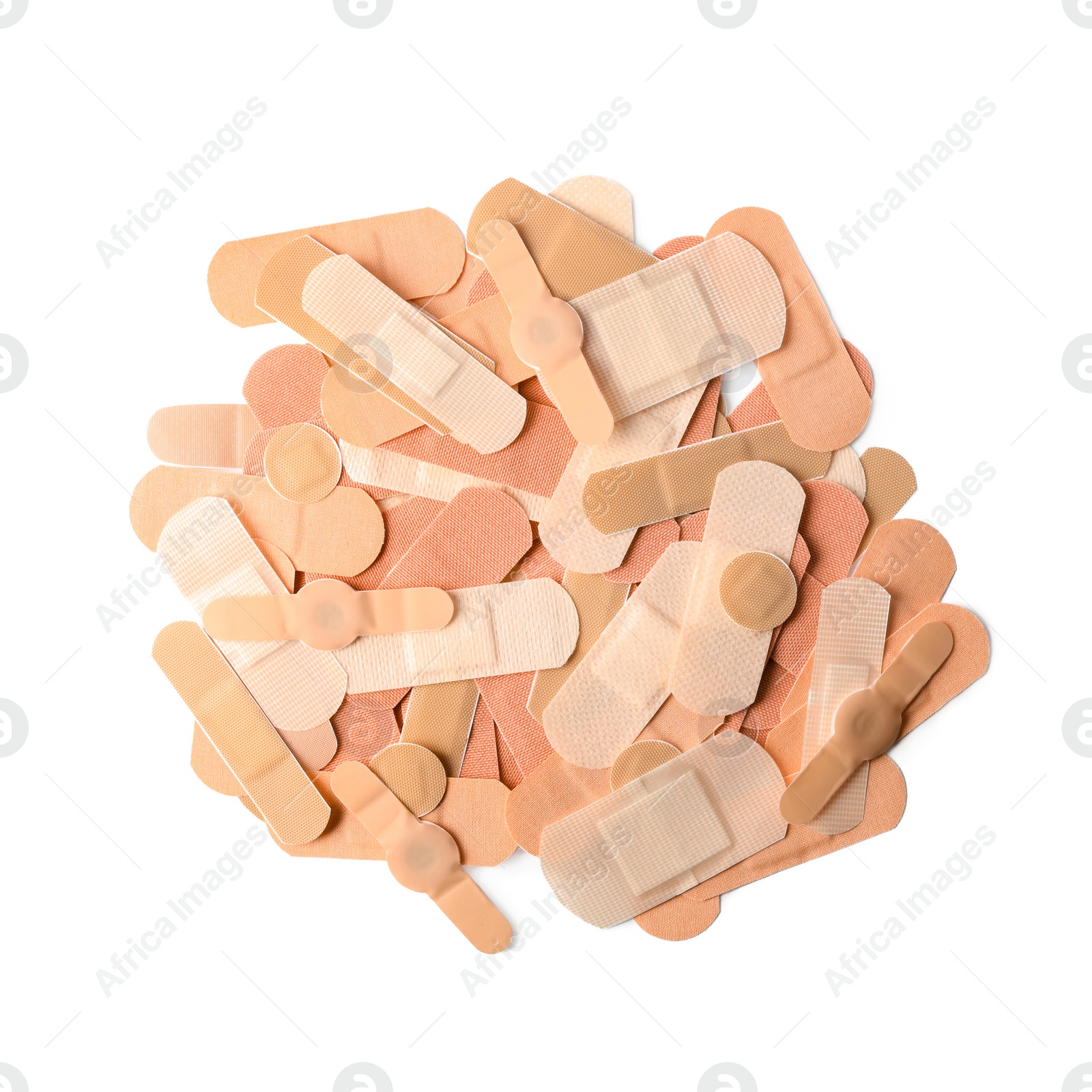 Different medical sticking plasters isolated on white, top view. First aid item Photo of Different medical sticking plasters isolated on white, top view. First aid item