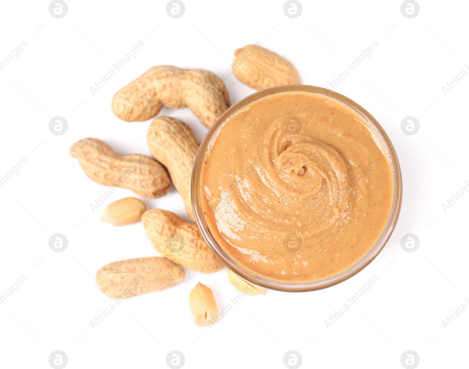 Photo of Delicious nut butter and peanuts isolated on white, top view