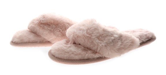 Photo of Pair of stylish soft slippers on white background