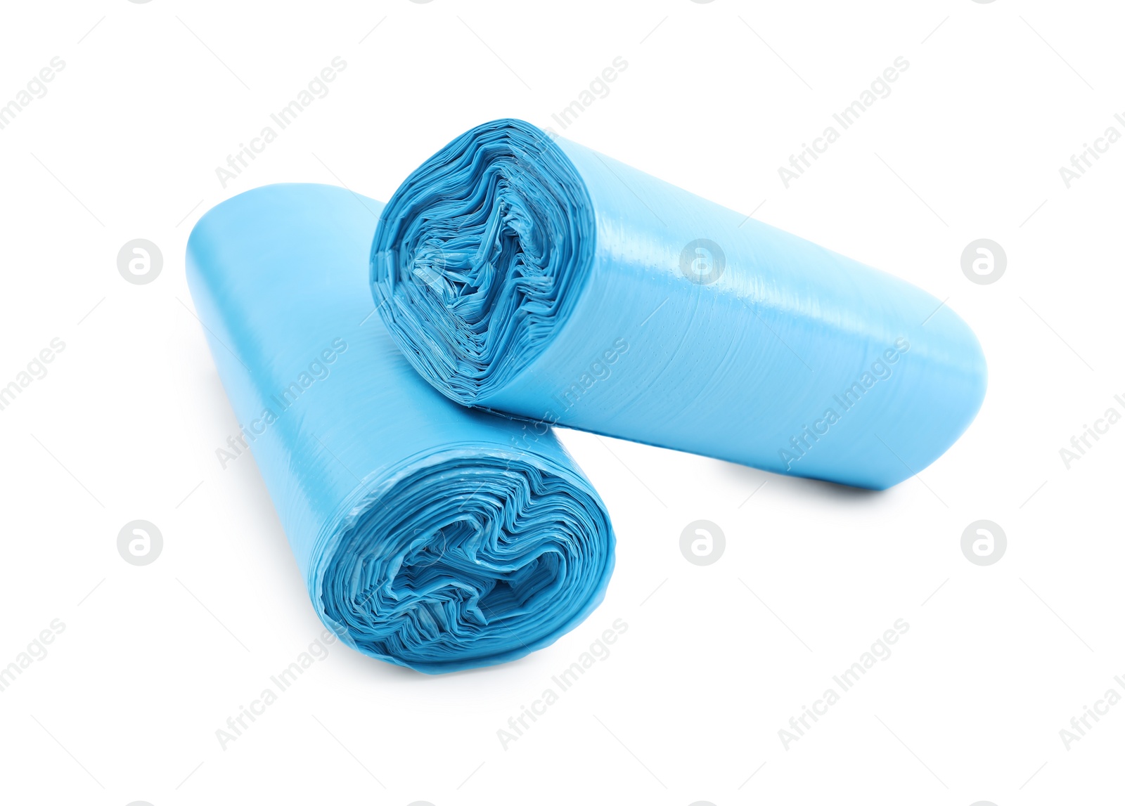 Photo of Two rolls of light blue garbage bags isolated on white