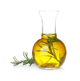 Glassware with rosemary oil on white background