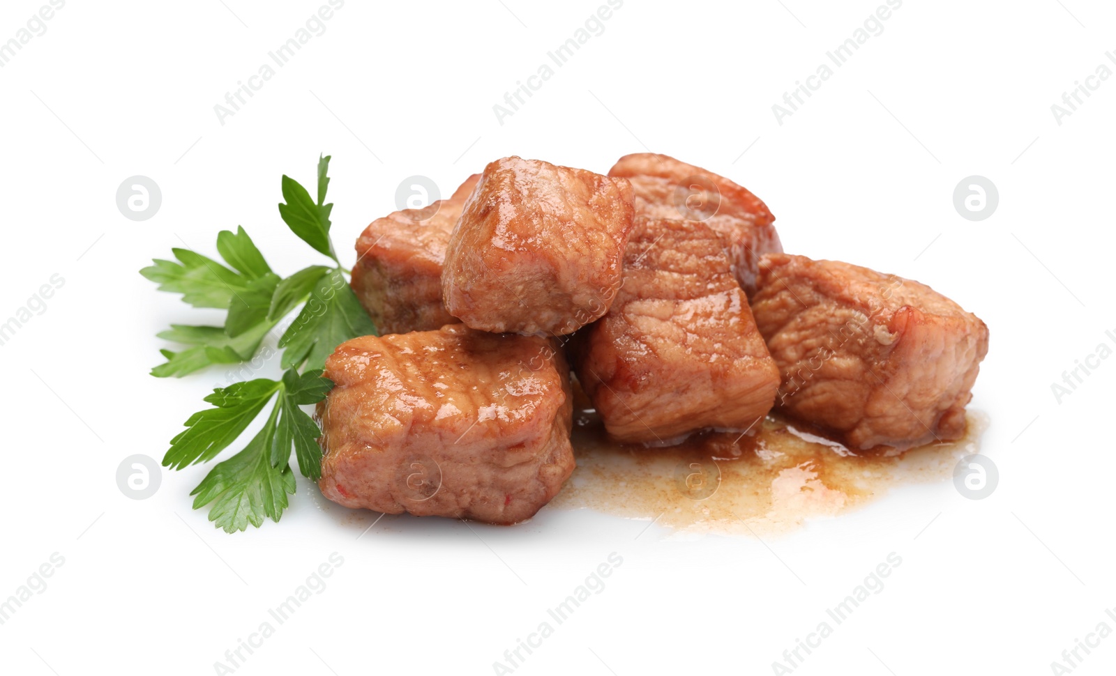 Photo of Pieces of delicious cooked beef and parsley isolated on white. Tasty goulash