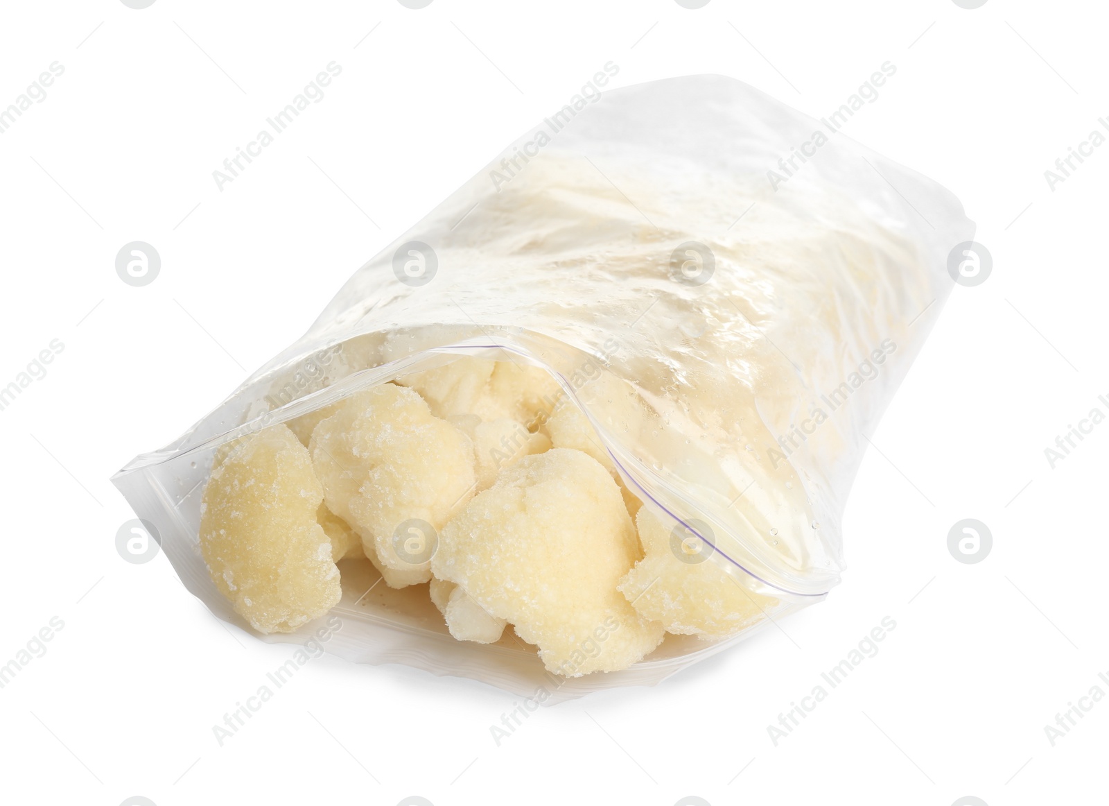 Photo of Frozen cauliflower florets in plastic bag isolated on white. Vegetable preservation