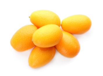 Photo of Fresh ripe kumquats on white background, top view. Exotic fruit