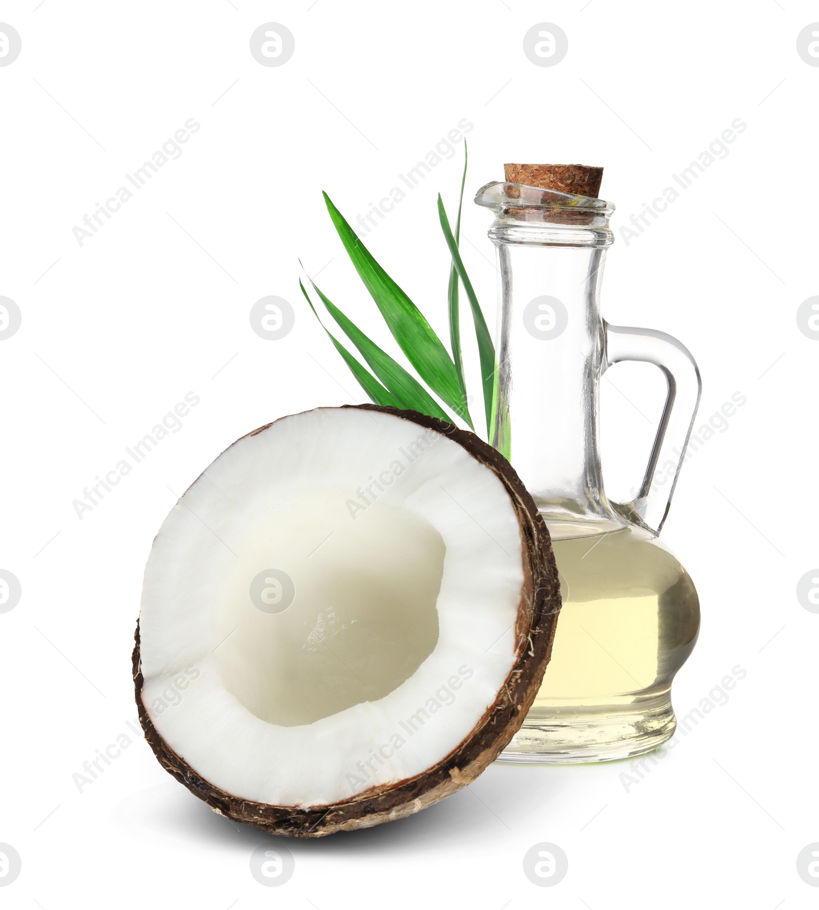 Image of Bottle of coconut cooking oil and fruit on white background