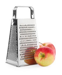 Photo of Stainless steel grater and fresh apples on white background