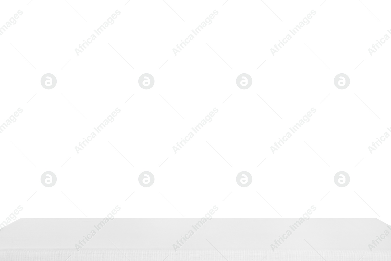 Photo of Table with white tablecloth isolated on white