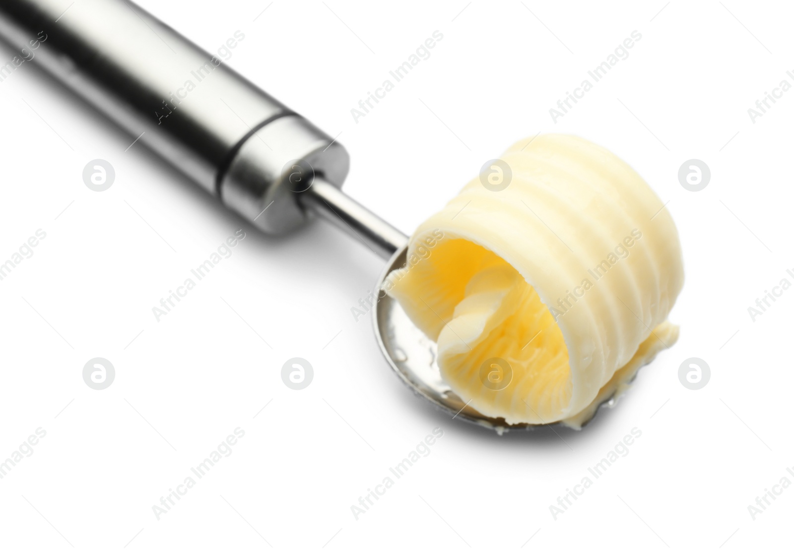 Photo of Knife with butter curl on white background