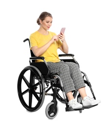 Photo of Woman in wheelchair with mobile phone isolated on white
