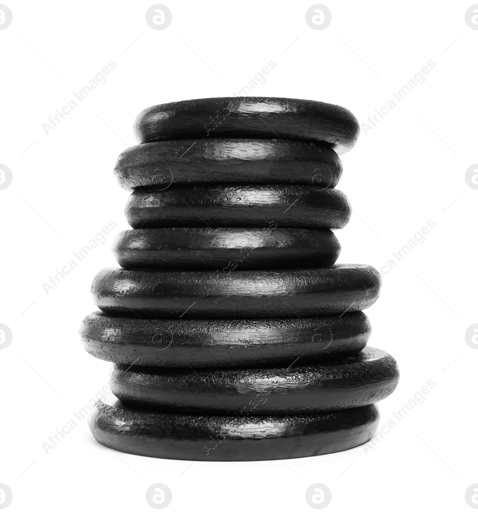 Photo of Many different weight plates on white background. Sporting equipment