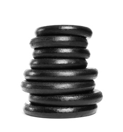 Photo of Many different weight plates on white background. Sporting equipment