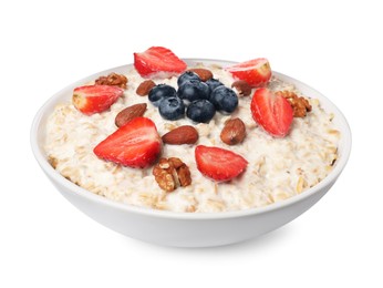 Photo of Tasty boiled oatmeal with berries and nuts in bowl isolated on white