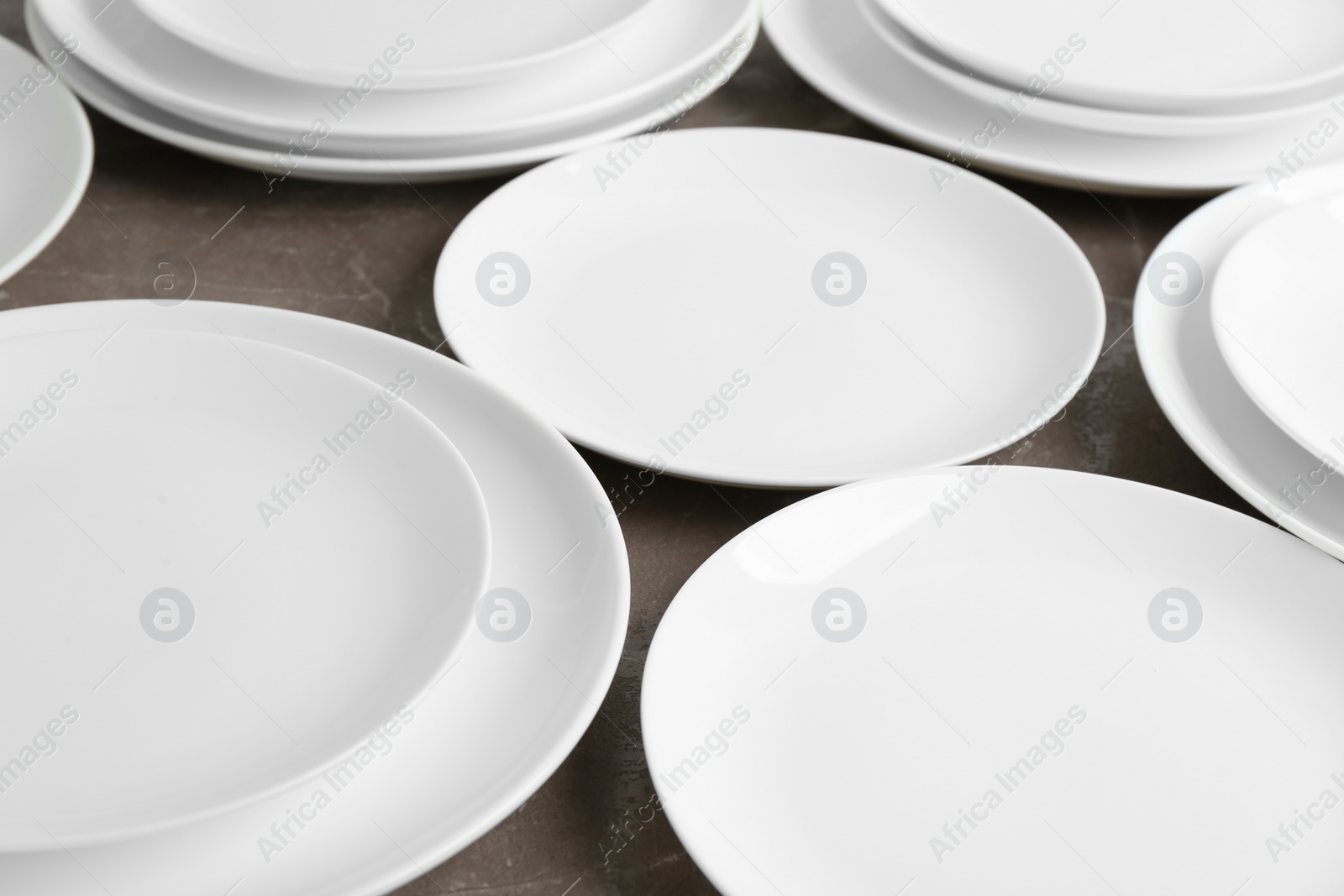 Photo of Set of new ceramic dishware on table