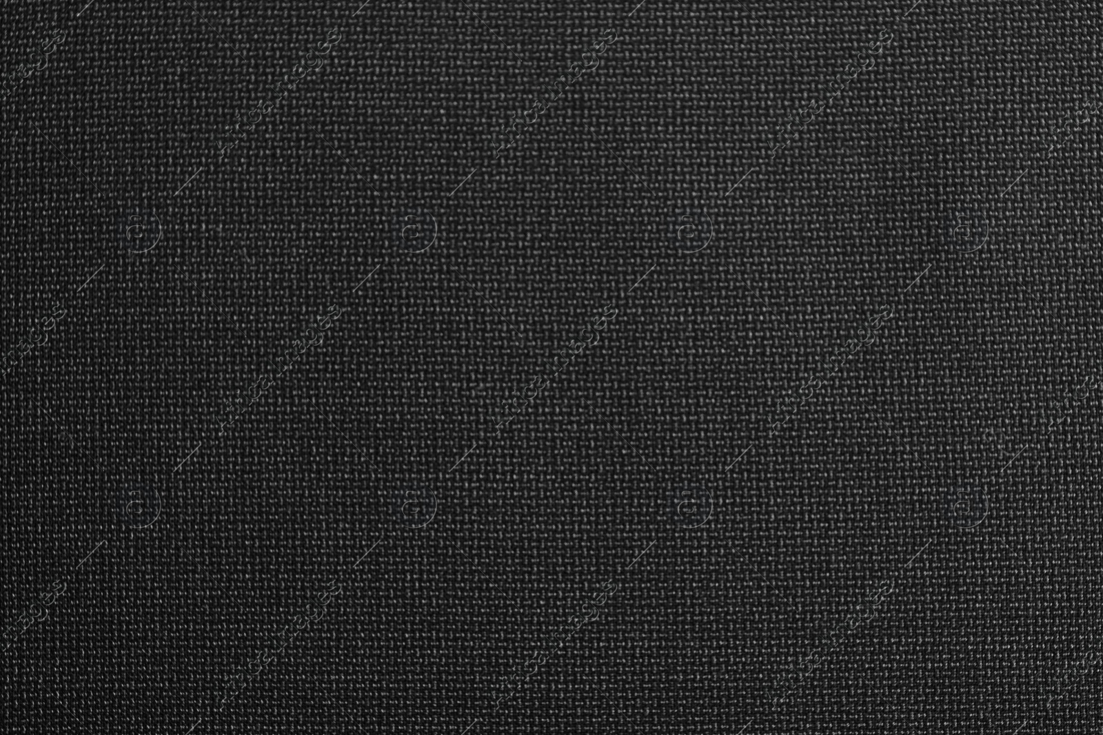 Photo of Texture of dark fabric as background, closeup