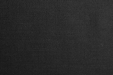Photo of Texture of dark fabric as background, closeup